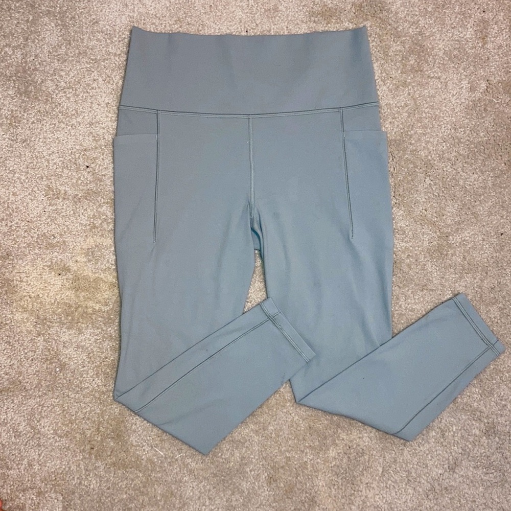 Athleta Salutation Stash Pocket II 7/8 Leggings